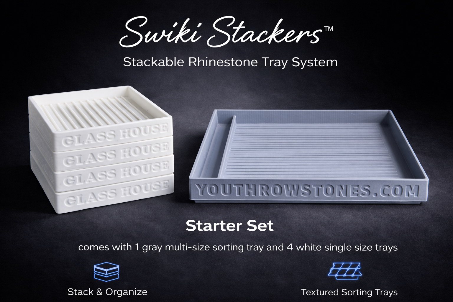 One large grays stackable rhinestone tray with tool holder and four smaller white rhinestone trays.